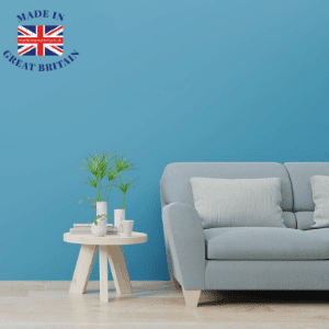 best british furniture brands, made in britain, sofa and side table with blue background, british blog
