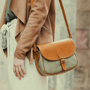 chapman bags, made in england, woman with canvas shoulder bags, best british handbag makers, top uk handbag brands, british handbag makers, british handbag designers