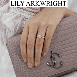 woman's hnd wearing a lily arkwright lab grown diamond engagement ring made in uk