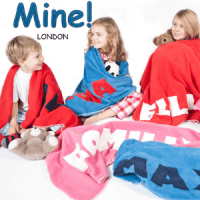 mine london, children sat on floor with towels wrapped around their shoulders, british made kids blankets and towels