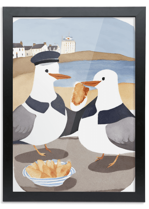 British seaside scene with seagulls eating fish and chips, one wearing a hat